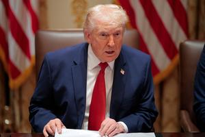 President Donald Trump speaks during a meeting in the Cabinet Room of the White House on March 26.
