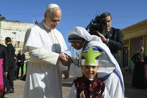 A religious sister greets Pope Leo XIV at the Notre Dame d’Afrique Kindergarten, run by the Missionary Sisters of Charity, near Algiers, Wednesday, April 15, 2026. | Credit: Vatican Media