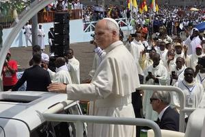 Pope Leo XIV greets 120,000 people gathered at Japoma Stadium in Douala, Cameroon, for a papal Mass on April 17, 2026.