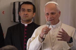 Pope Leo XIV speaks aboard the papal plane from Malabo, Equatorial Guinea, to Rome, following an 11-day trip in Africa, on April 23, 2026. 
