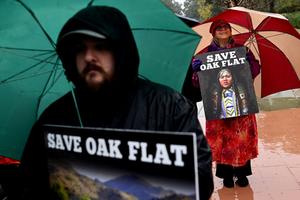 Protestors stand outside the 9th Circuit Court in Pasadena, California, protesting a mining deal that would destroy the Oak Flat sacred site in Arizona, Tuesday, March 21, 2023. 