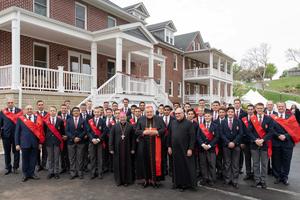 Faculty and students of St. Louis de Montfort Academy are pictured here with Cardinal Raymond Leo Burke (center), who is flanked by Auxiliary Bishop William Waltersheid of the Diocese of Pittsburgh and Father Gregory Karpyn of the Diocese of Allentown on April 25, 2026. 