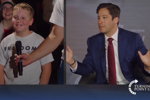 A young 10-year-old boy from Billings, Montana, reveals his calling to the priesthood during a Turning Point USA event featuring Michael Knowles and Matt Walsh.