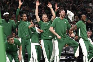 Luke Kornet celebrates with Celtics teammates