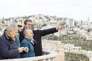 Monsignor Hugues de Woillemont looks out over the city during a visit to Taybeh, east of Ramallah, the last entirely Christian town in the West Bank. 