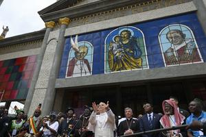 Pope Leo XIV releases a dove outside of St. Joseph's Cathedral in Bamenda, Cameroon, on April 16, 2026. 