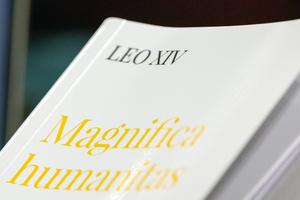 A copy of Pope Leo XIV’s encyclical Magnifica Humanitas is displayed Monday during the presentation of the document in the Vatican’s New Synod Hall.