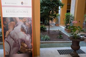 A banner of the exhibit “Sistine Chapel Revelations: An Immersive Exhibition” is displayed at the Palazzo Cardinal Cesi on May 22, 2026, in Rome. | Credit: Ishmael Adibuah/EWTN News