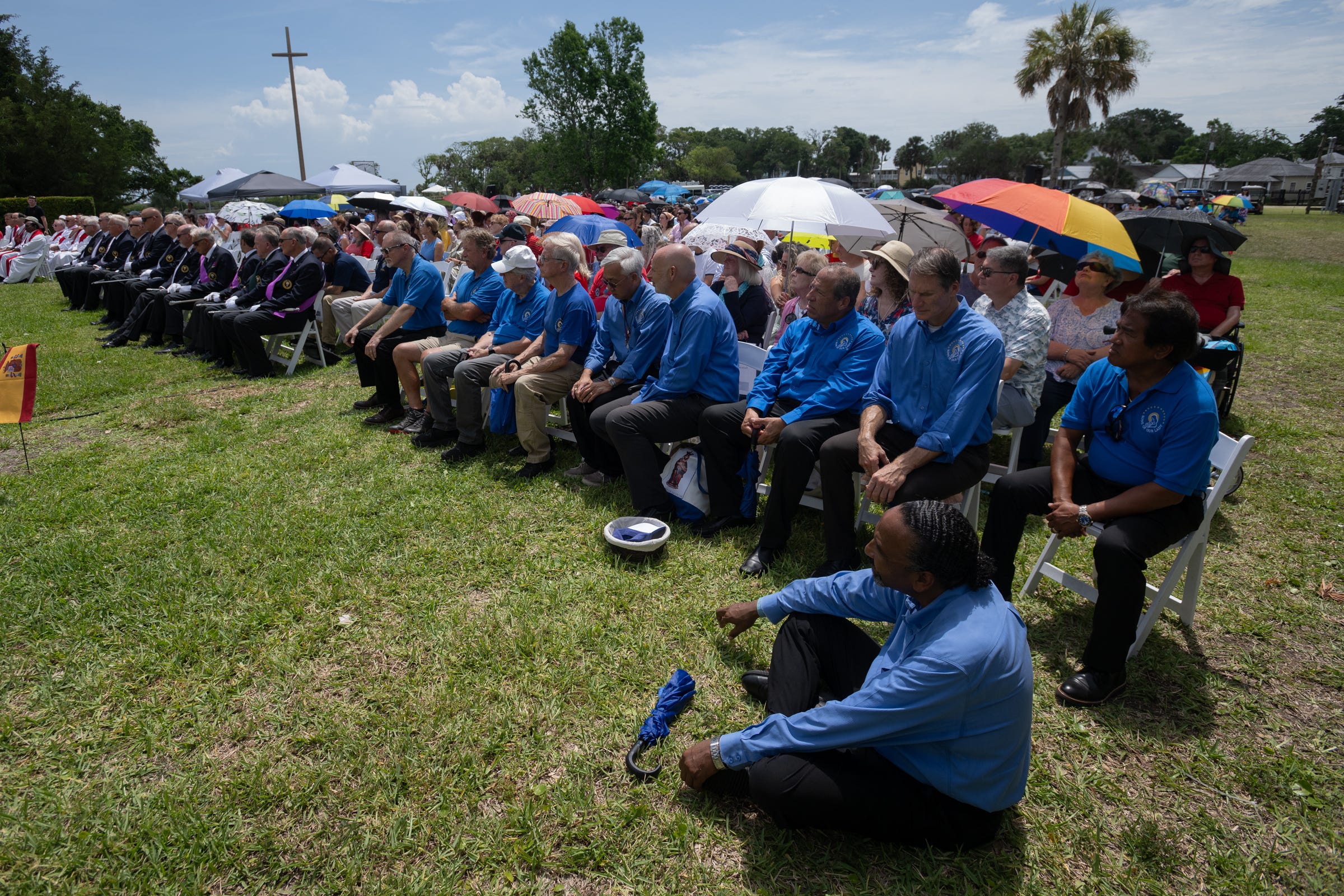 Pilgrims rest awaiting Mass. 