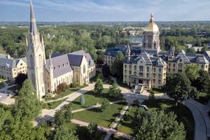 The Basilica of the Sacred Heart and the Main Building are seen on the campus of the University of Notre Dame in South Bend, Indiana.