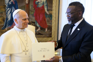 Chicago Mayor Brandon Johnson presents Pope Leo XIV with an invitation to visit the city, the Pope’s hometown, during a meeting on May 28, 2026, at the Vatican. 