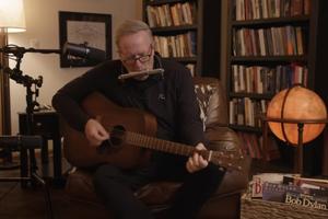 Bishop Robert Barron plays guitar, harmonica, and sings a Bob Dylan classic paying tribute to his favorite artist.