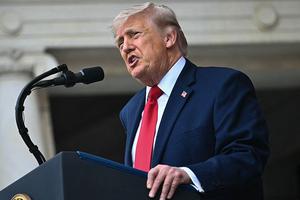U.S. President Donald Trump speaks during the National Memorial Day Observance at the Memorial Amphitheatre in Arlington National Cemetery in Arlington, Virginia on May 25, 2026. 