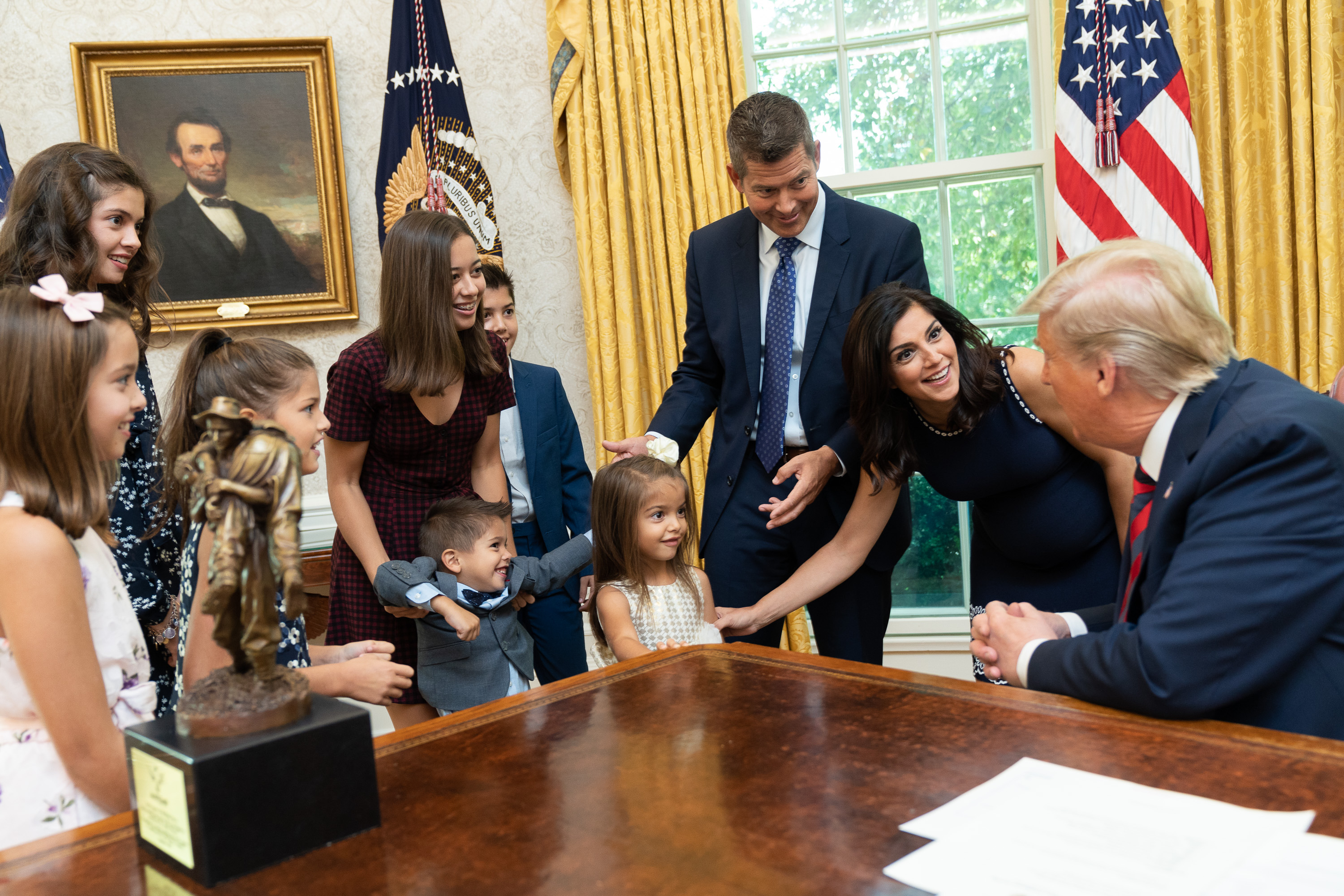 Rachel Campos-Duffy and US Secretary of Transportation Sean Duffy visit with President Trump in the Oval Office during a visit with their children.