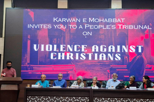 Participants attend the People's Tribunal on Violence Against Christians in India, titled 'Caravan of Love,' in New Delhi on June 1, 2026. Catholic activist John Dayal is seated third from right. 