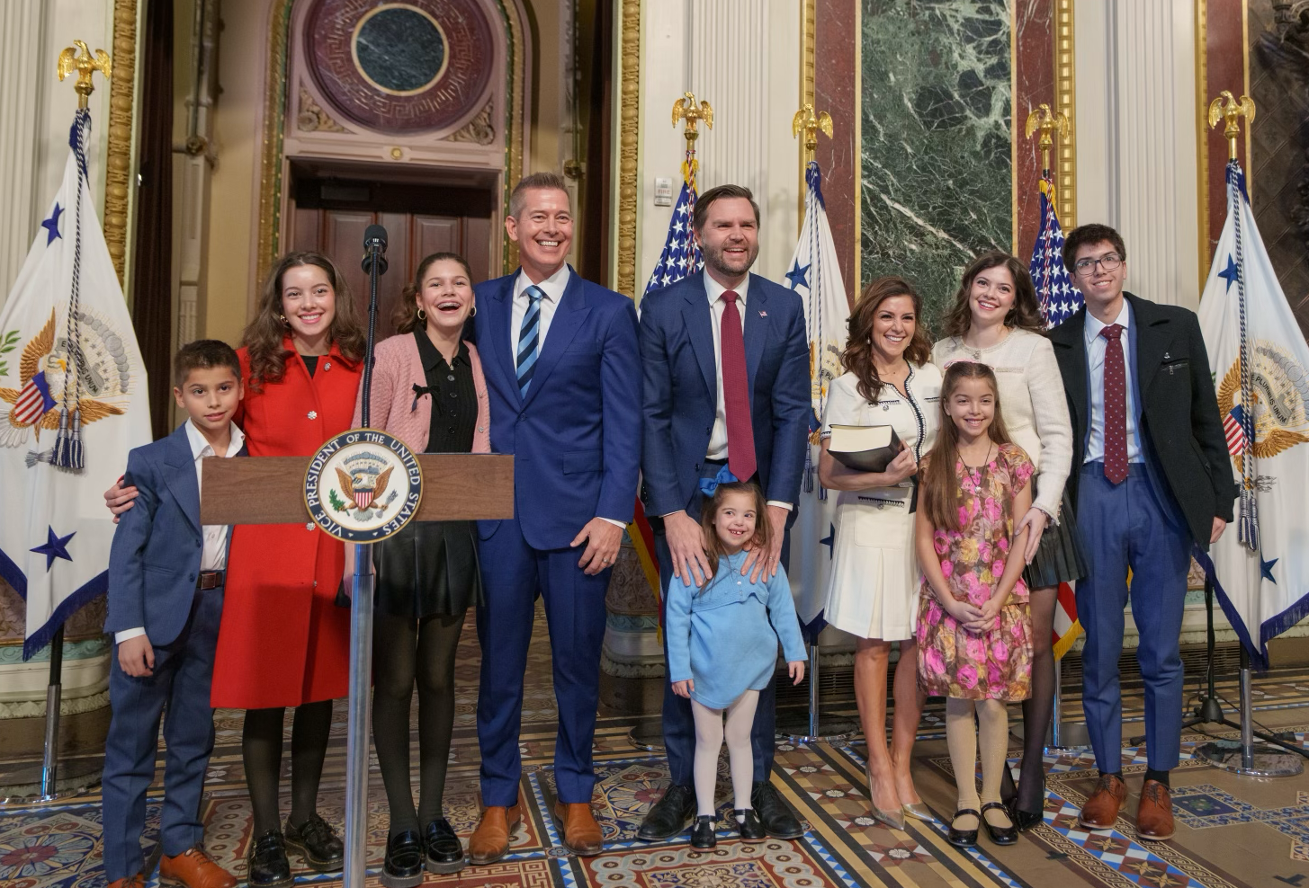 The Duffy family takes a picture with Vice President JD Vance on the day Sean Duffy assumed the office of Secretary of Transportation.