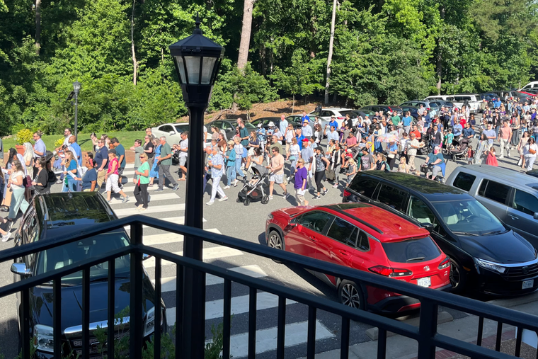 Hundreds of Catholic process with the Blessed Sacrament during the Eucharistic procession in Williamsburg, Virginia, June 5, 2026. 