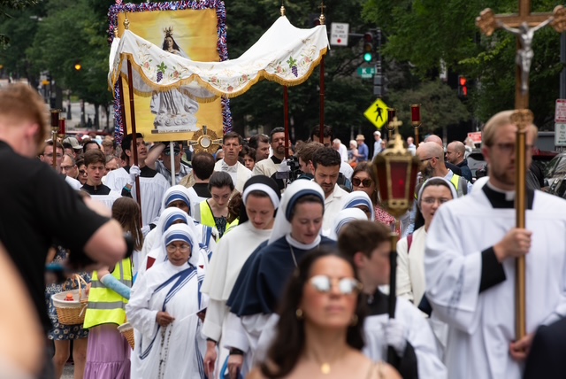 Pilgrims follow the Blessed Sacrament during a Eucharistic procession in Washington, D.C., June 6, 2026. 