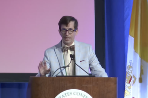 Dartmouth College professor, Santiago Schnell addresses the USCCB assembly on June 10.