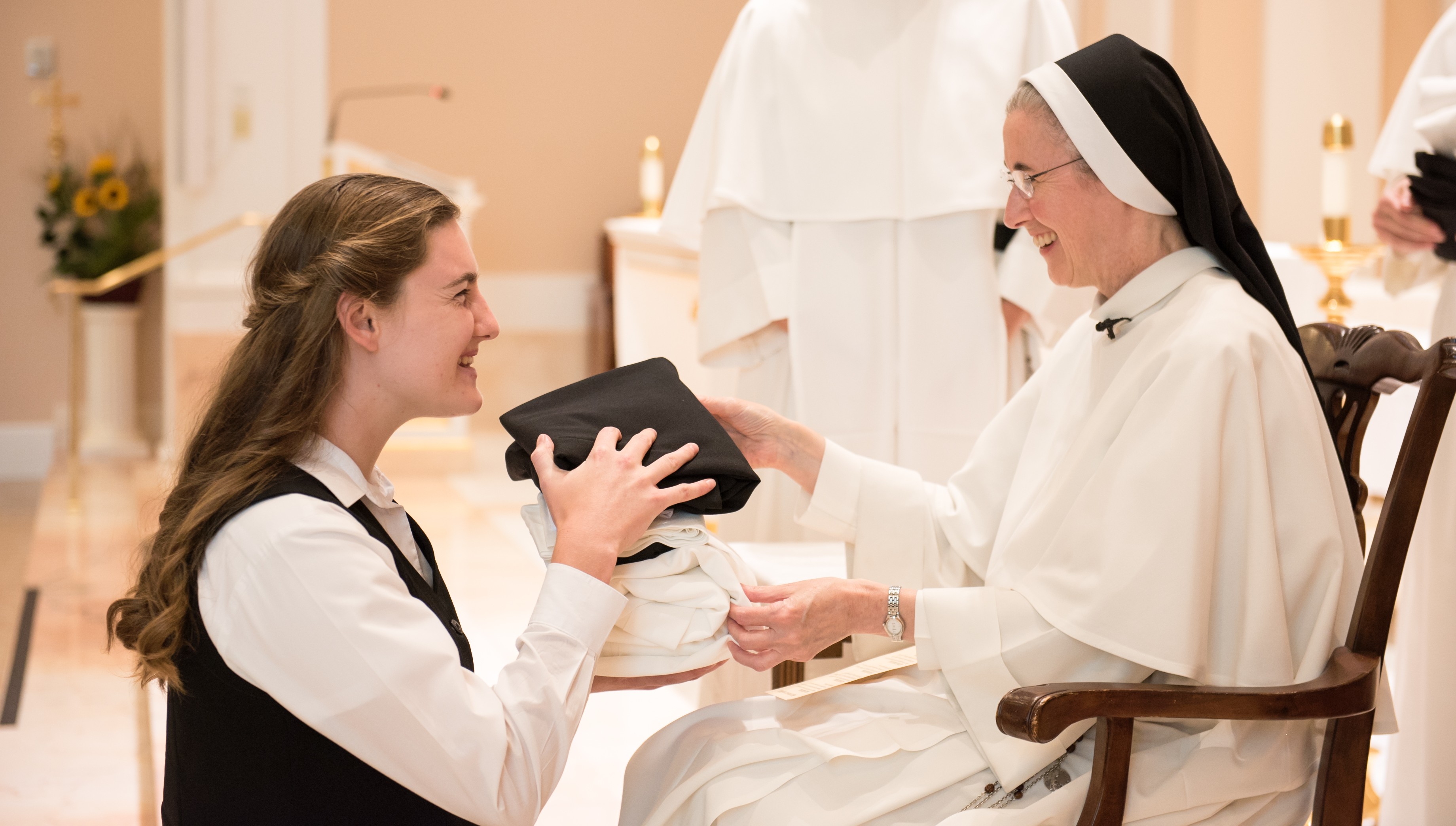 A postulant receives her habit and religious name during the clothing ceremony for the Dominican Sisters of St. Cecilia in Nashville. (Photo: Courtesy of the Dominican Sisters of St. Cecilia, Nashville, Tennessee)