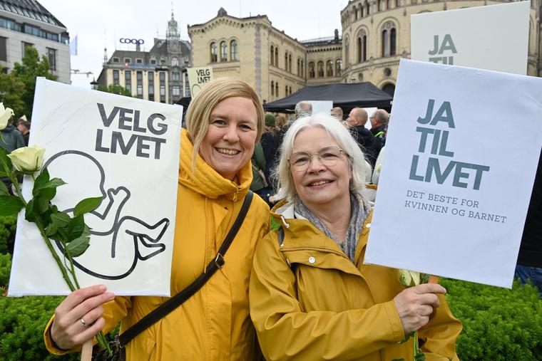 Ragnhild Helena Aadland Høen, public affairs officer for the Norwegian Catholic Bishops’ Conference, stands with Maria Fongen, family pastoral adviser for the Catholic Diocese of Oslo, with the Norwegian Parliament (Stortinget) in the background. 