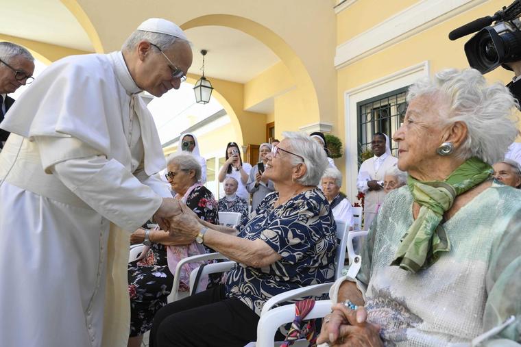 Pope Leo XIV greets residents of St. Martha Home for the Elderly in Castel Gandolfo, Italy, during a visit on July 21, 2025. 