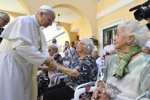 Pope Leo XIV greets residents of St. Martha Home for the Elderly in Castel Gandolfo, Italy, during a visit on July 21, 2025. 