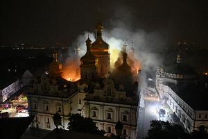 Smoke and fire rises from the Dormition Cathedral in the Orthodox complex of the Kyiv Pechersk Lavra following a Russian missile strike on the Ukrainian capital Kyiv on June 15, 2026, amid the Russian invasion in Ukraine.