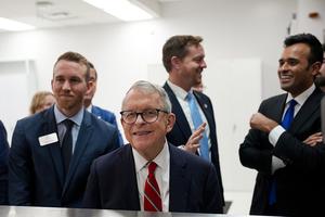 Ohio Gov. Mike DeWine, center, attends a tour of a Thermo Fisher Scientific facility on March 11, 2026, in Reading, Ohio.