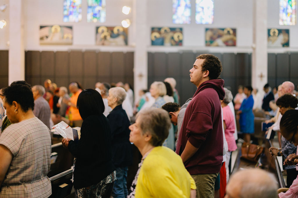 The faithful stand during the Consecration of the Sacred Heart at St. Louis Cathedral in New Orleans, La., on June 14, 2026. 