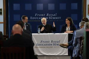 rchbishop Salvatore Cordileone of San Francisco, center, speaks at a panel in May 2026 on Catholic education at the Front Royal Summit where Catholic educators are calling for reform.