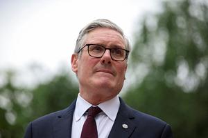 British Prime Minister Keir Starmer looks on as he awaits Switzerland's Federal President Guy Parmelin on the sidelines of the G7 summit on June 16, 2026 in Evian-les-Bains, France. 