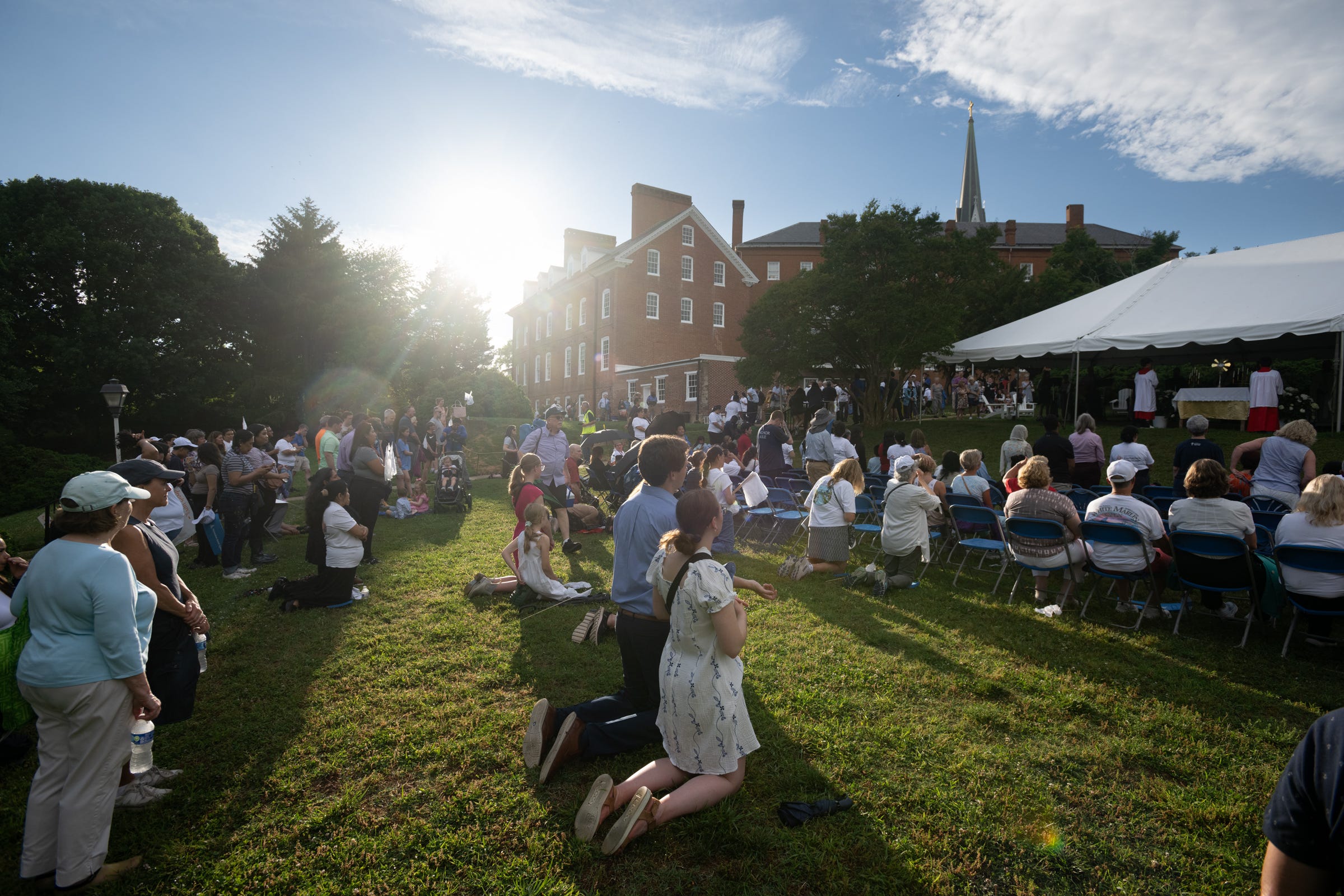 At St. Mary’s in Annapolis, on land where John Carroll once lived, the faithful knelt in the late light. Faith and founding met quietly in the grass.