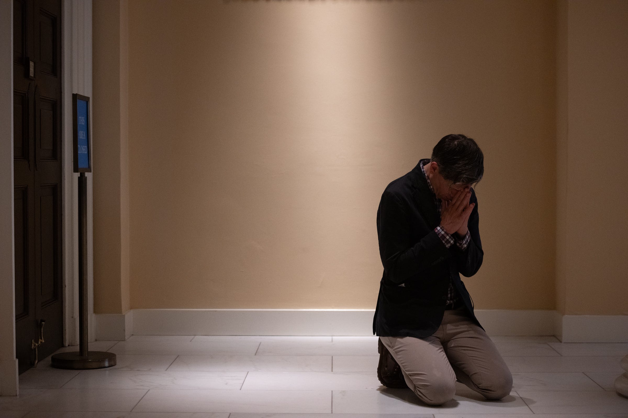 Away from the crowds, one man knelt alone. A pilgrimage across America had found its way to a single soul.