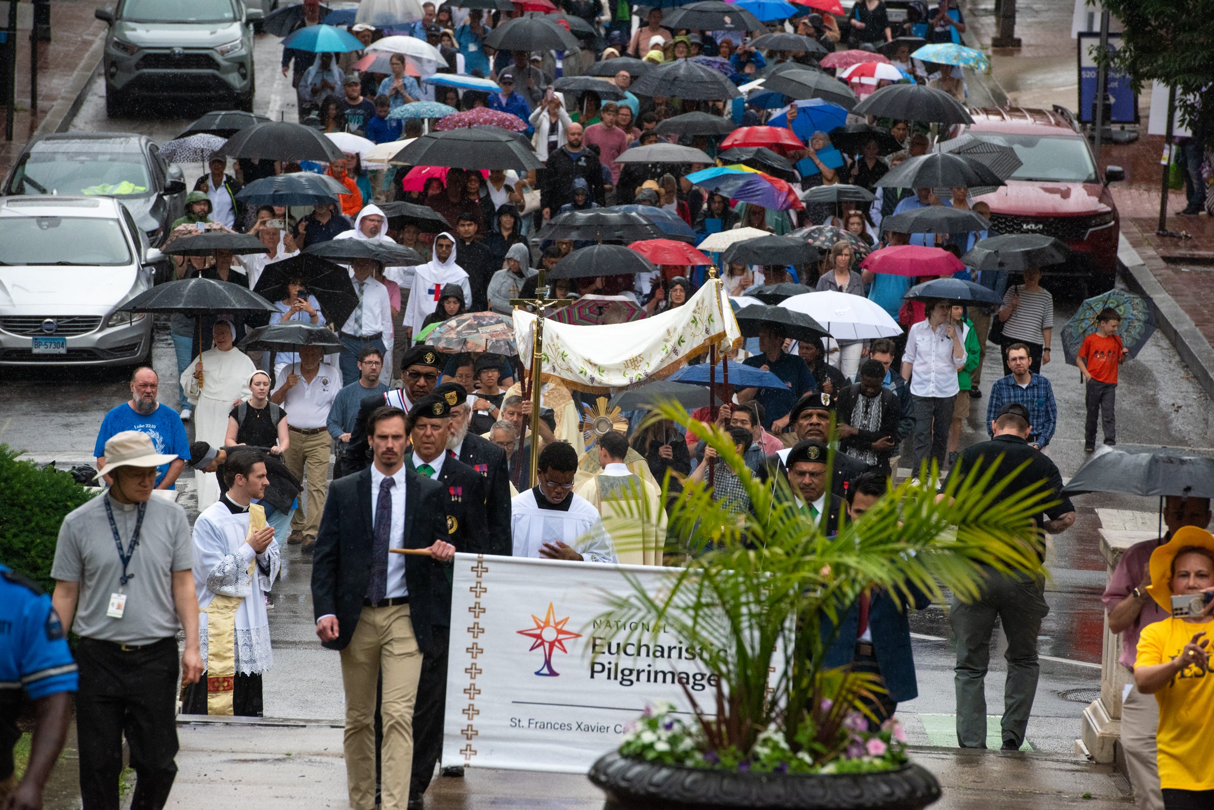 The rain fell hard, and still they walked. Grace does not wait for perfect weather.