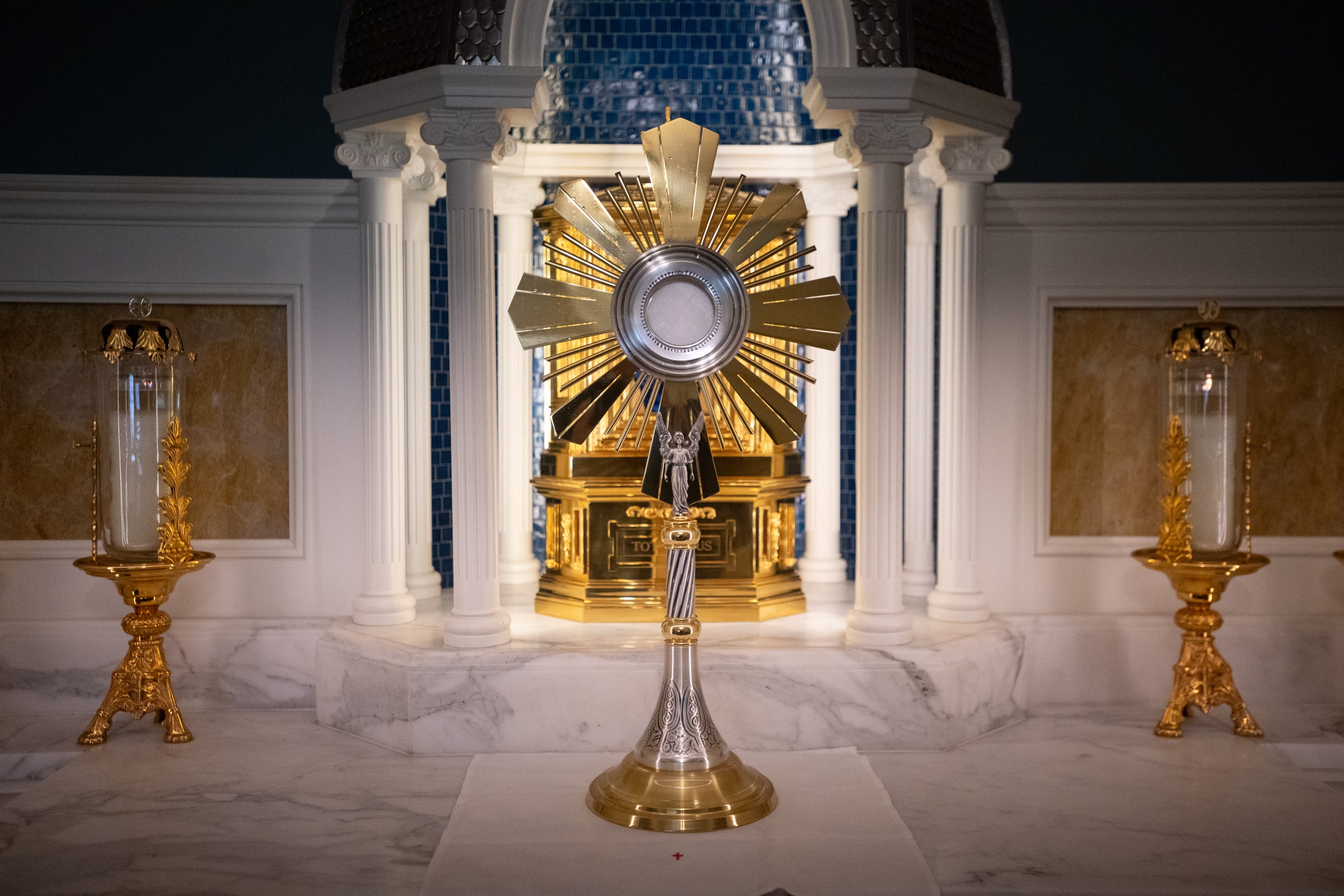 BALTIMORE- In the adoration chapel, the road became still. After every procession, every mile, every crossing He remains.