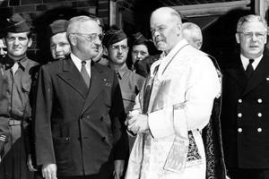 President Harry S. Truman and Father L. Curtis Tiernan, chief chaplain of the U.S. Army Forces in the European Theater, speak after Mass during the Potsdam Conference in Potsdam, Germany, on July 22, 1945. The two first met while serving together in World War I.