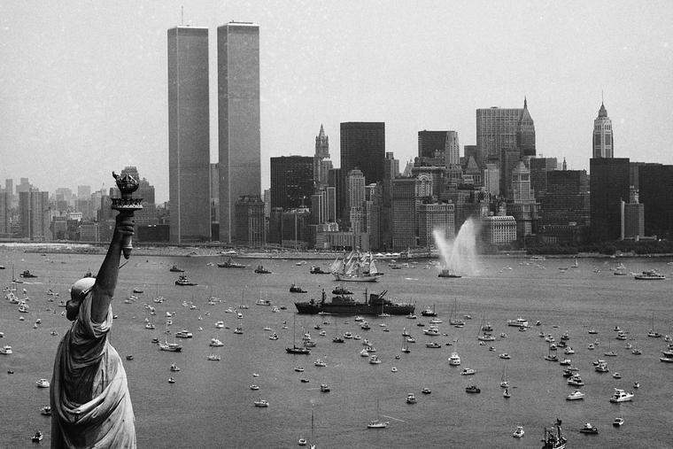 Ships participate in Operation Sail between the Statue of Liberty and the World Trade Center to celebrate the U.S. bicentennial in New York on July 4, 1976. 
