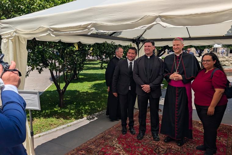 Archbishop Ronald Hicks of New York takes a photo with members of the faithful at the Pontifical North American College in Rome on June 29, 2026.