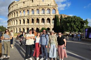 From left to right, Colton Ruud, Madison Campbell, professor Michael Douglas, Wendy Jackson and Samantha Sheridan, visit the Colosseum in Rome.