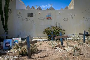 A cemetery on the Italian island of Lampedusa, where on July 4, 2026, Pope Leo XIV will visit the graves of migrants and refugees who died while trying to cross the Mediterranean Sea. Crosses made from the wood of shipwrecked boats mark the graves of children. 