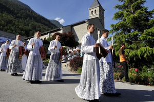 Priests and deacons of the Society of St. Pius X walk to Mass in Econe, western Switzerland, on June 29, 2009. |