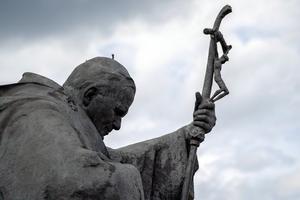A statue of St. John Paul II stands outside the Pontifical Sanctuary of St. John Paul II in Kraków.