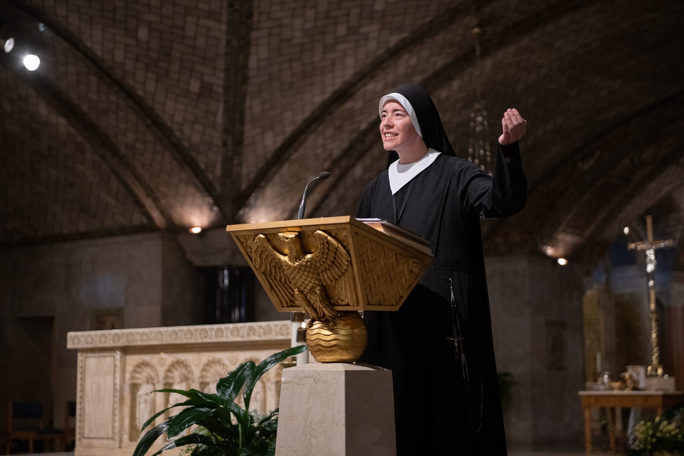 Sister Gabrielle sings the responsorial at an afternoon Mass in the Crypt Church at the Basilica of the National Shrine of the Immaculate Conception at the 2026 GIVEN Institute Forum.