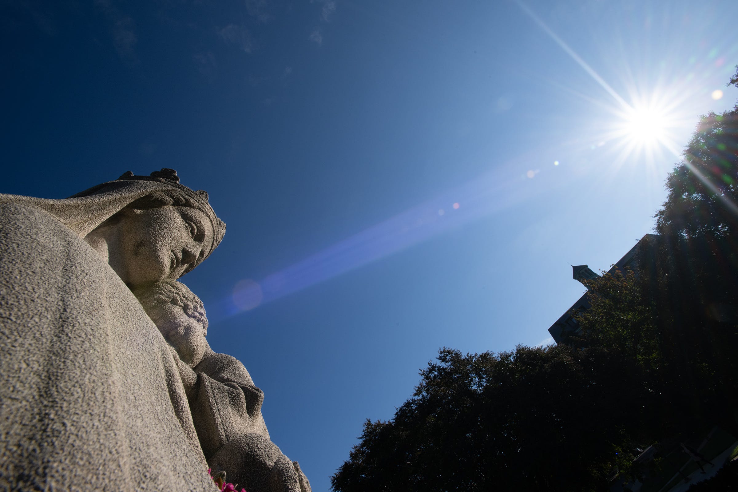 A statue of the Child Jesus held in the Blessed Mother’s arms near the Basilica of the National Shrine of the Immaculate Conception at Catholic University.