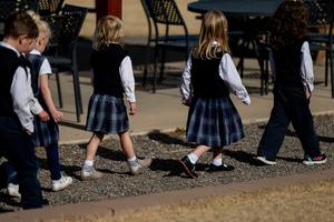 Students walk together at St. Mary Catholic Virtue Preschool in Littleton, Colorado. 