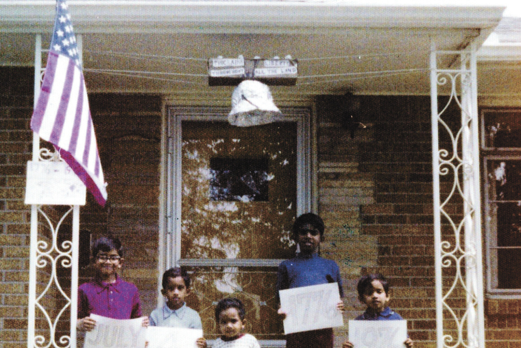 Future Bishop Earl Fernandes (right), age 3, stands with his siblings on the front porch of the family’s home during the U.S. bicentennial celebration on Independence Day, July 4, 1976.