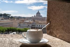 Enjoy coffee with an Eternal City view.