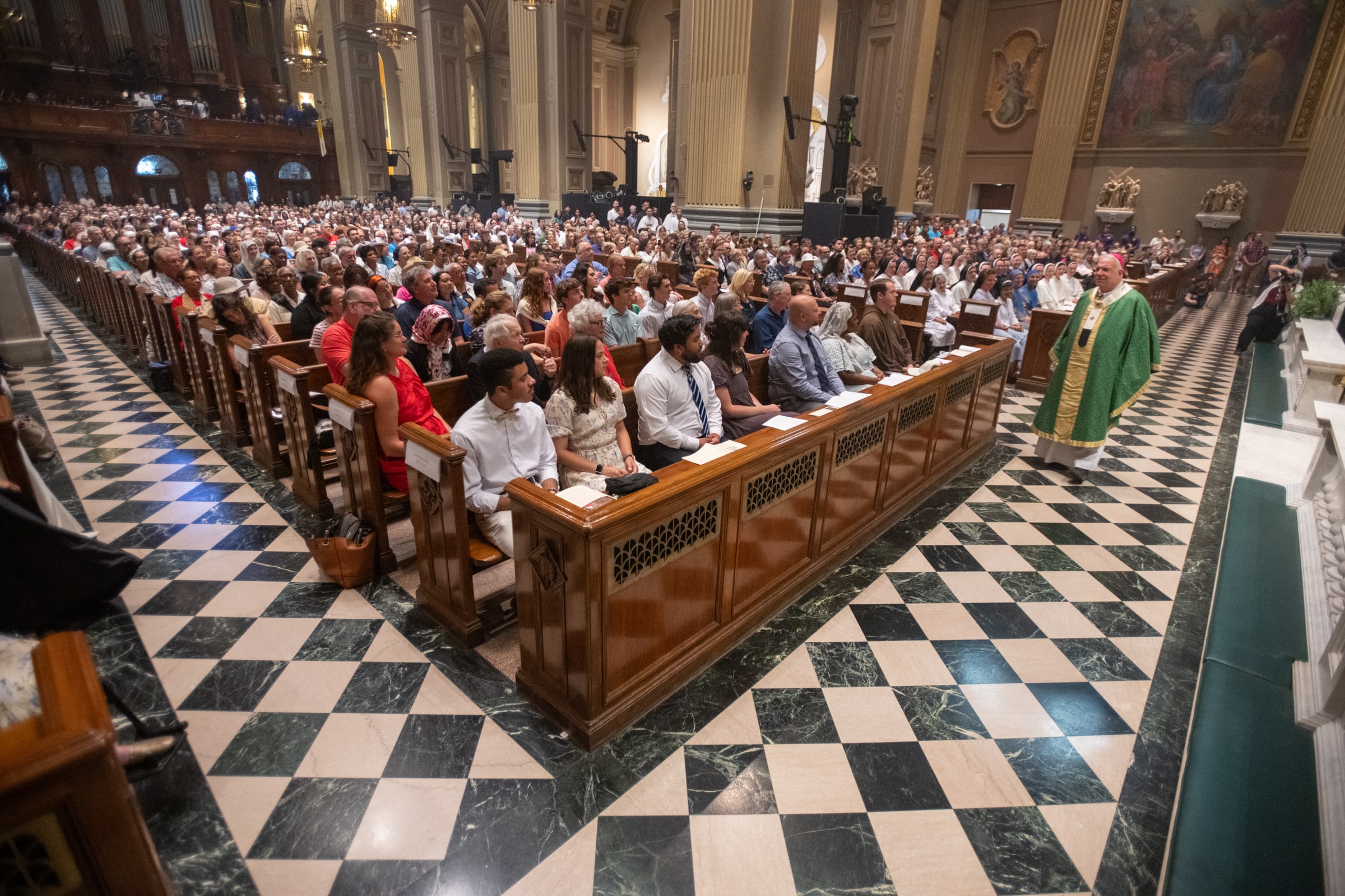 Archbishop Pérez stood before a congregation filled with expectation, his words filled with gratitude and hope as the faithful prepared to process with Jesus Christ through the streets of ‘The City of Brotherly Love.”