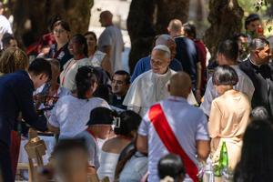 Pope Leo XIV greets guests during a lunch for poor people at Castel Gandolfo outside of Rome, July 11, 2026. The event was the second lunch the pope has hosted with those facing poverty since the beginning of his pontificate. 